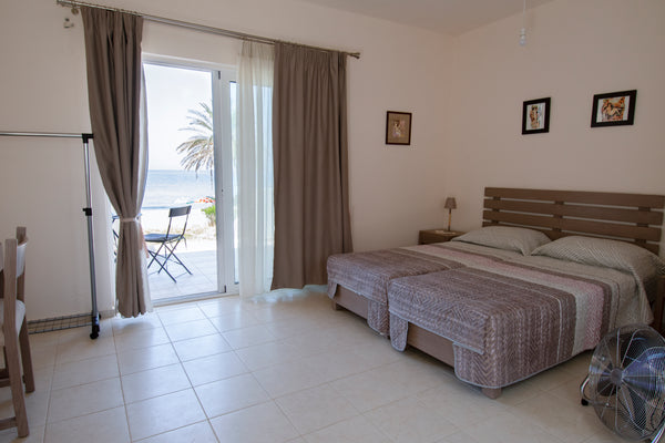 My Studio, alongside its twin on the upper floor and the two others next to it,   Stalis Beach Side Studio #3 Entire rental unit vacation rental 50736934