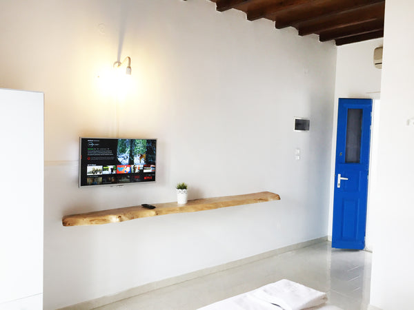 The cozy studio is equipped with air conditioning system, kitchen with utensils, Kini, Greece Loukia's Cozy Studio Entire rental unit vacation rental 13332814