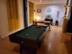 Appartement de 120m2 au rdc d’une bâtisse en pierre, dans un quartier calme,  à   Appartement spacieux avec terrasse et billard Entire rental unit vacation rental 48284416