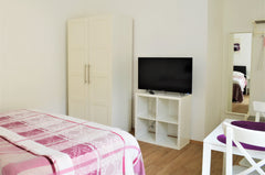 A bright and comfortable studio apartment equipped with a double bed, a wardrobe Prague, Czechia Cozy Happy Days Apartments Entire rental unit vacation rental 630862261333421255