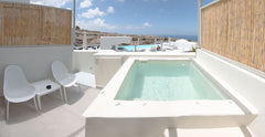 The complex is built with attention to detail and respect for the Cycladic style  Adorno Oia-Queen Suite with outdoor heated hydromassage tub Room in hotel vacation rental 49220921