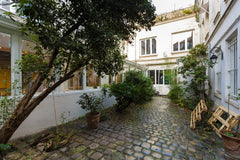 This charming little studio apartment overlooks a courtyard, hidden in a passage Paris, France Charming studio in a courtyard in Paris Entire rental unit vacation rental 16343031