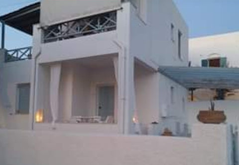 House Irini is a beautiful two-floors detached house.<br /><br />Just 20 meters   House Irini in Kini - Super sunset - Beach at 20mt Entire home vacation rental 594106468140462011