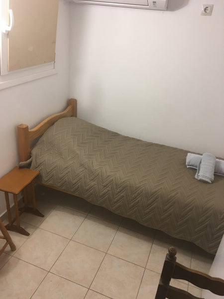 small basic   budget room 4 m2with a single bed  on the roof <br /> with bathroo  budget single room irene 2 Private room vacation rental 42244440