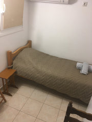 small basic   budget room 4 m2with a single bed  on the roof <br /> with bathroo  budget single room irene 2 Private room vacation rental 42244440
