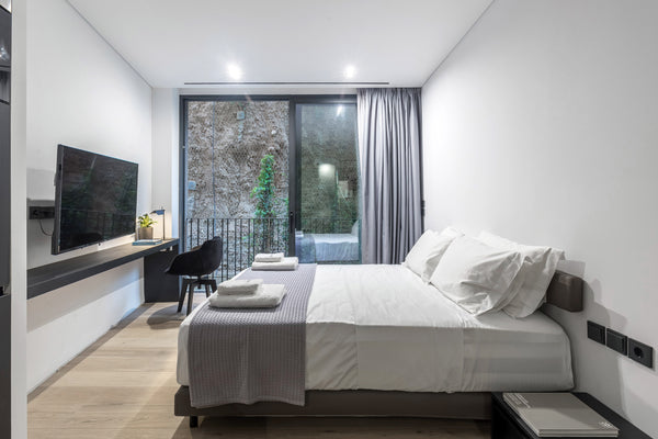 With soft neutral palettes, a comfortable living room, a cozy bedroom and a spac CY The Duke suite 101/studio Room in aparthotel vacation rental 38174347