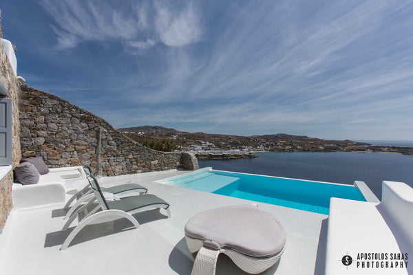 South located house, elegant infinity pool surrounded by summer furniture and so London, United Kingdom VillaAqua-Luxury&SeaviewPsarou ESL1173K132K0918601 Cycladic home vacation rental 6344857