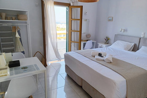 Enjoy your holiday in our 2-bedroom apartment with private balconies overlooking Greece Cozy 2-bedroom apartment for families or 4 people Entire condo vacation rental 666331008091747435