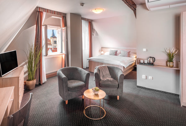 Enjoy your stay in our Family Room that offers two comfortable king size beds. Y  Family Room - Palac U Kocku Room in hotel vacation rental 53730714