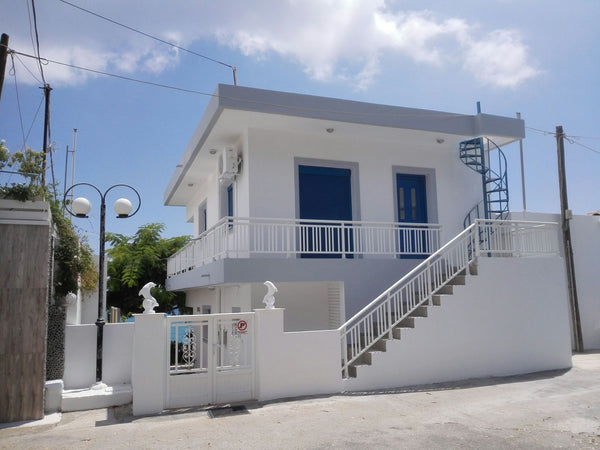 Magnificent view with a large courtyard in front of the house, the sea is about  Greece Villa Amalia Entire home vacation rental 24075663
