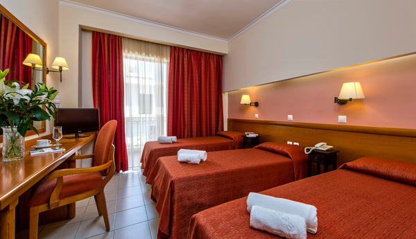 Room size 12 m² <br />Features air conditioning, TV, minibar and balcony.<br />R Chania, Greece Triple Hotel Room with Balcony in Chania Room in hotel vacation rental 32354511