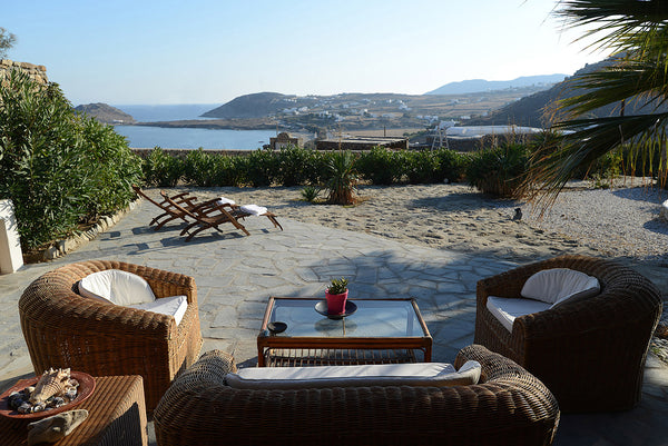 A large 80 sq m luxury apartment with a lovely private garden equipped with chai Míkonos, Greece Luxury apartment Fokos, lounge area, sea view Entire serviced apartment vacation rental 21742588