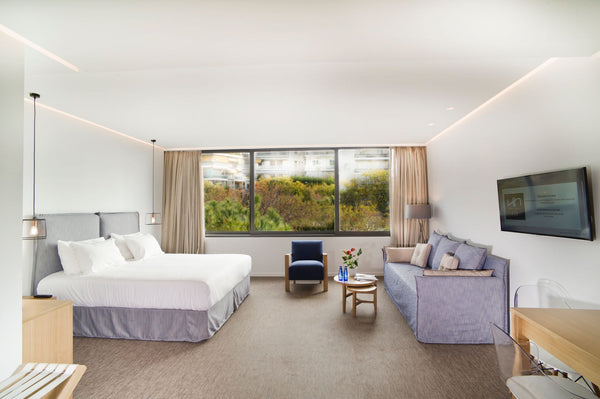 An sunlit spacious suite 39 square meters  / 420 square feet,  located on the fr Athens, Greece NLH Fix | Avenue Suite Room in hotel vacation rental 22071352