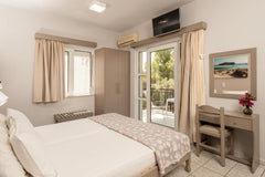 Niriis hotel is located 100m from the sea, in Herakleous street, Agii Apostoli a Chania, Greece Niriis hotel 4-bed, 2-room, 4km west Chania Room in hotel vacation rental 29919102