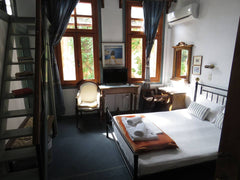 This spacious room is one of the 8 rooms of a  700 year old building with a Vene Greece Pension Theresa room #03. Classy with Sea View Room in boutique hotel vacation rental 27238294