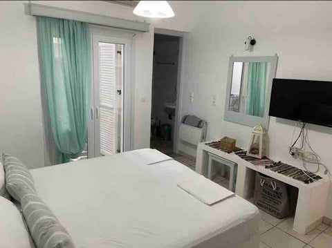 Big studio with one double bed and two single beds and full equipped kitchen ! A Alimos, Greece Cycladic studio “Argo” Entire home/apt vacation rental 47594515