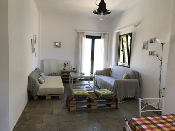 Relax and let the sea breeze take away all your troubles in this peaceful home.  Greece Cool and cozy 1-bedroom home, one breath from sea. Entire home vacation rental 665238808591910465