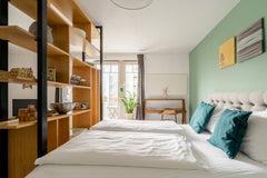 Fix breakfast in a sleek kitchen with vivid hardwood surfaces and dine at a cont Vienna, Austria Design-Savvy Studio Near Spittelau Station Entire rental unit vacation rental 33804530