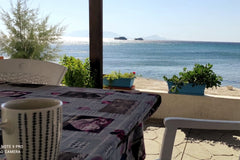 House with one available bedroom, bathroom, kitchen and living room. It has a do Greece House with courtyard next to the sea. Entire cottage vacation rental 24282737